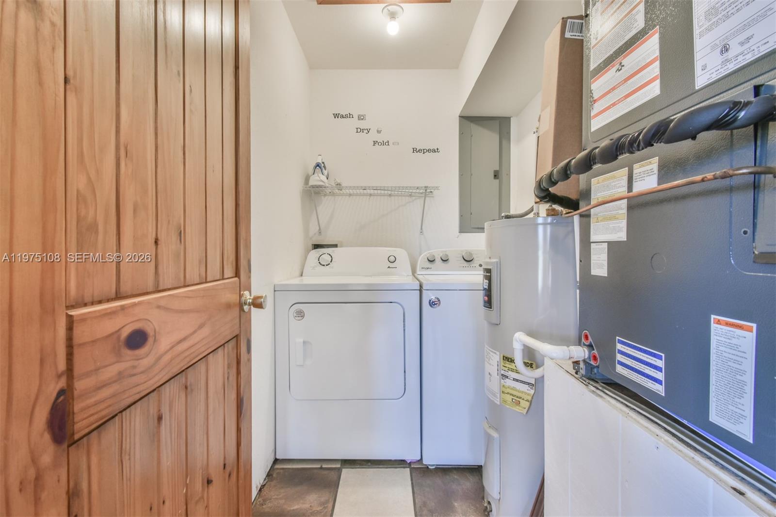 1216 Bugscuffle Road Hiawassee, GA 30546 - Photo 26 of 30 a utility room with dryer and washer