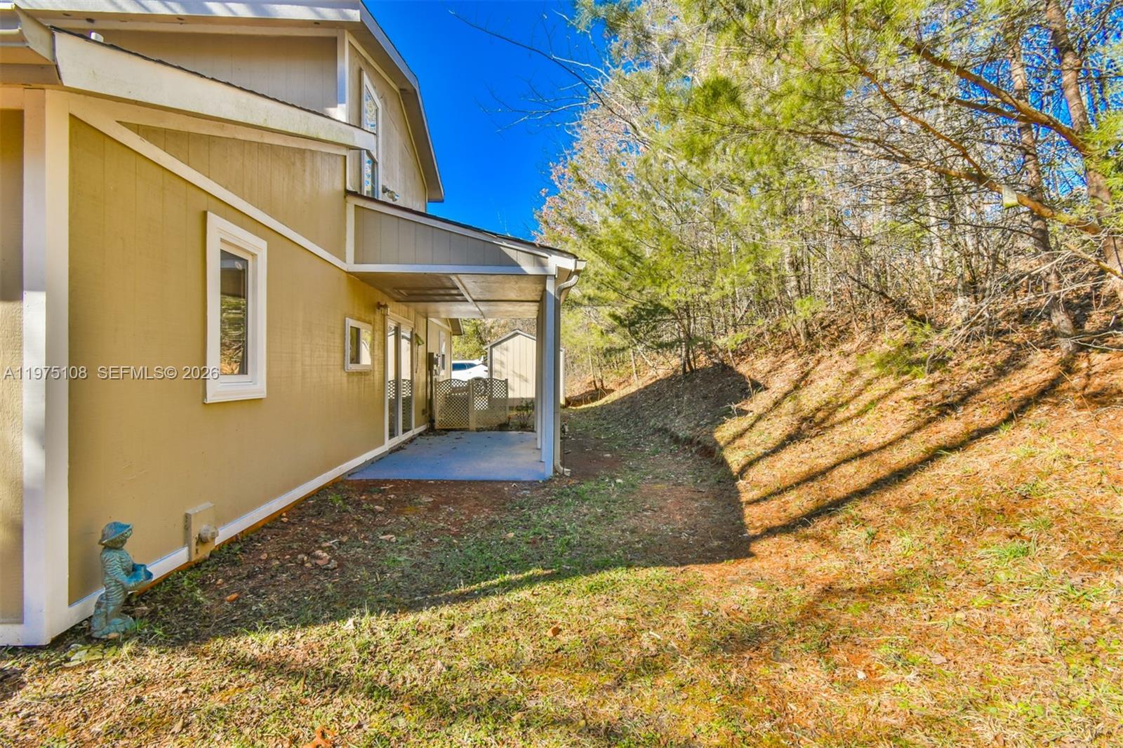 1216 Bugscuffle Road Hiawassee, GA 30546 - Photo 29 of 30 a view of a house with a snow in the background