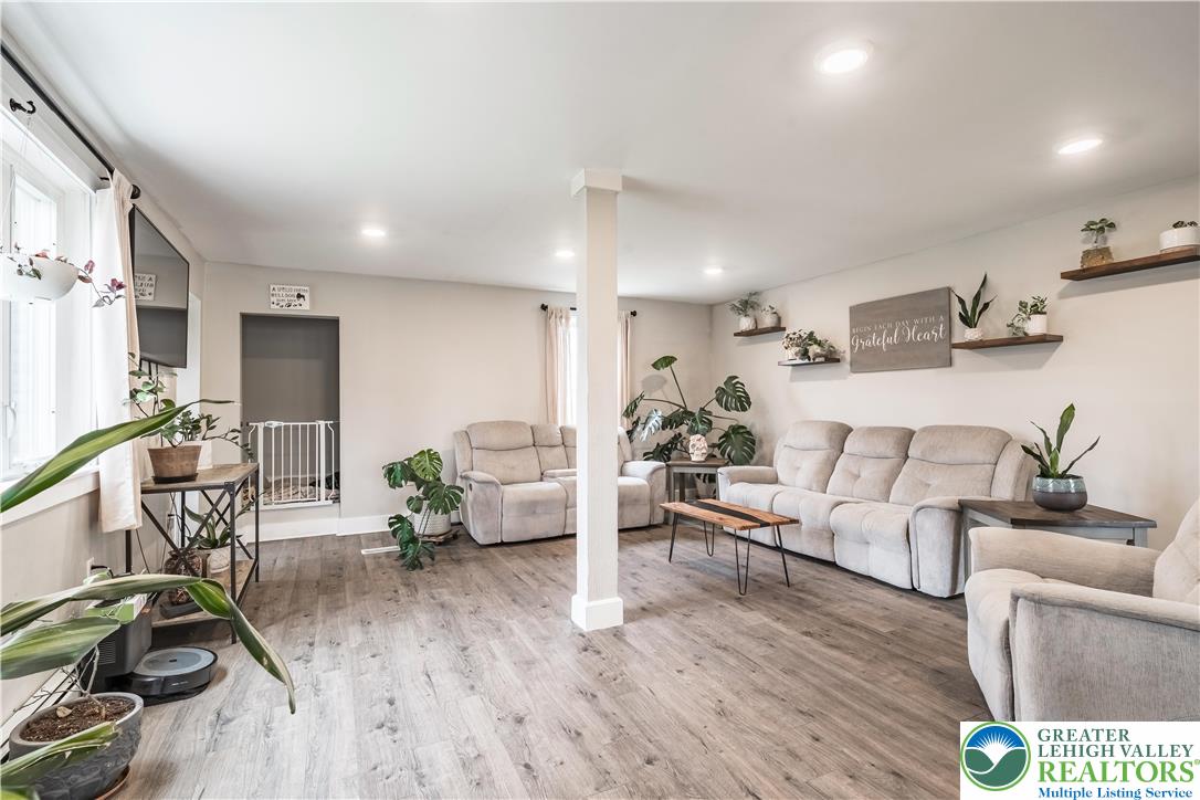 7056 Behler Road New Tripoli, PA 18066 - Photo 7 of 12 a living room with furniture and a wooden floor