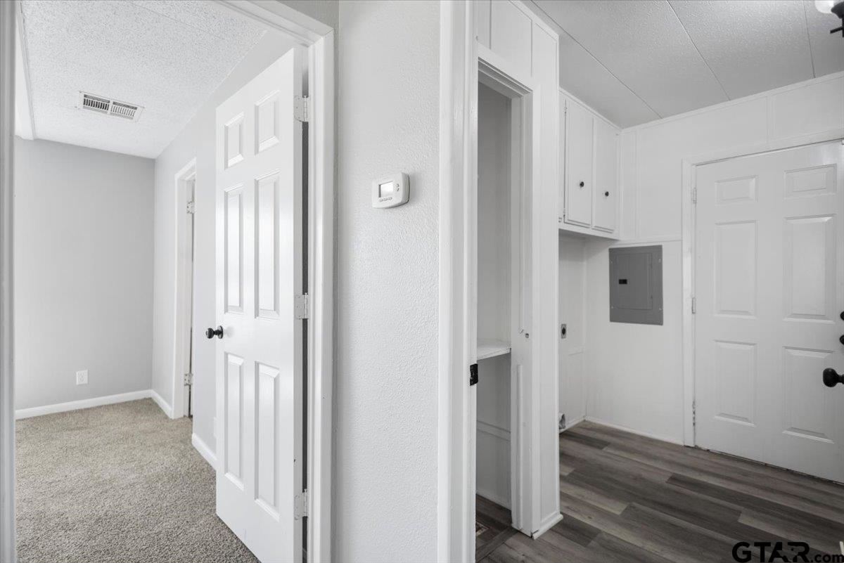 18607-c R 498 C R 498 Lindale, TX 75771 - Photo 28 of 41 a view of a hallway with wooden floor and entryway