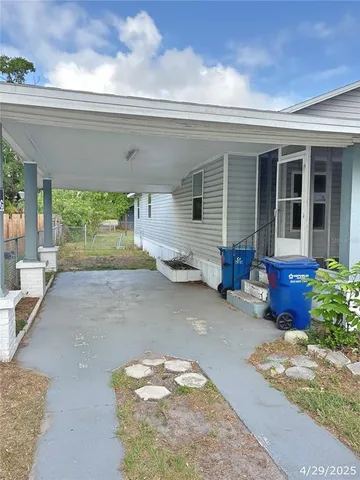 a view of a house with a patio
