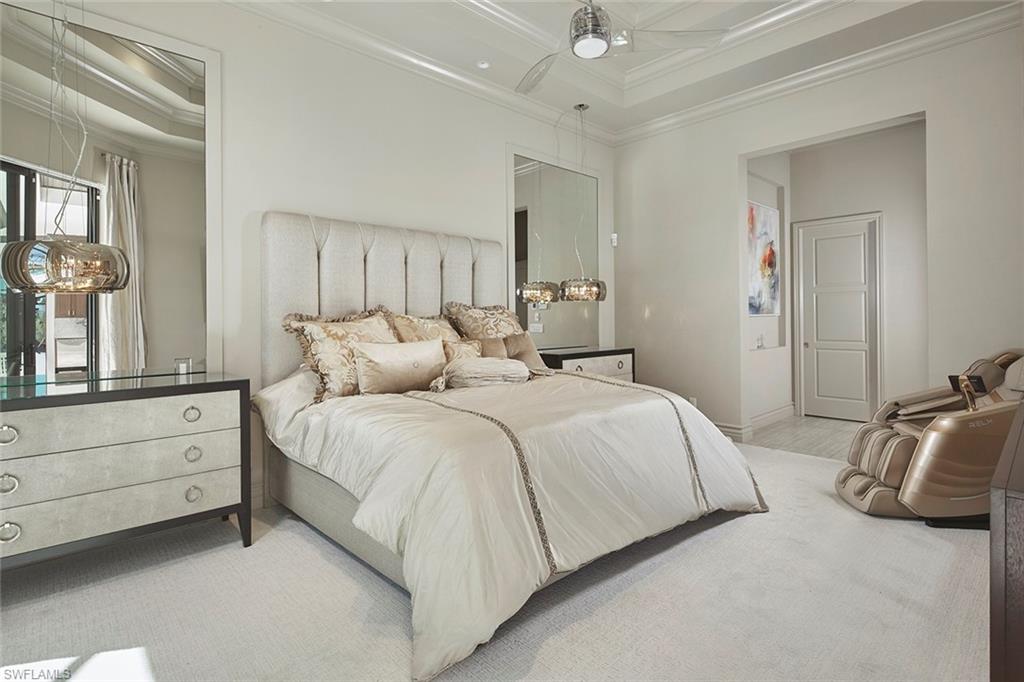 16434 Seneca Way Naples, FL 34110 - Photo 12 of 34 a bedroom with a bed and window