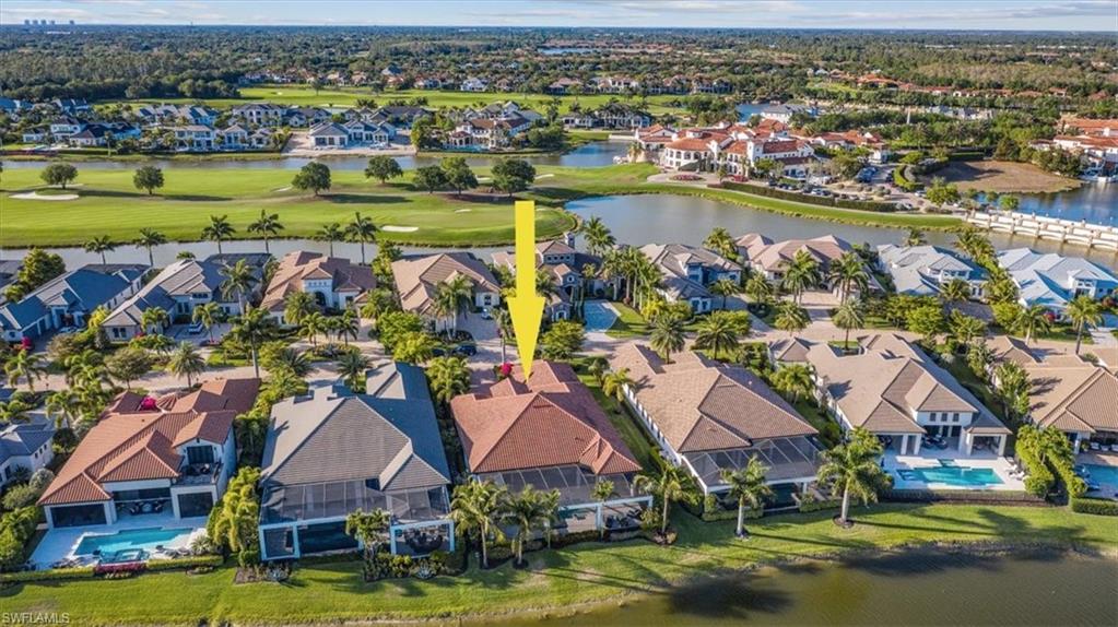 16434 Seneca Way Naples, FL 34110 - Photo 26 of 34 an aerial view of a city with a lake view