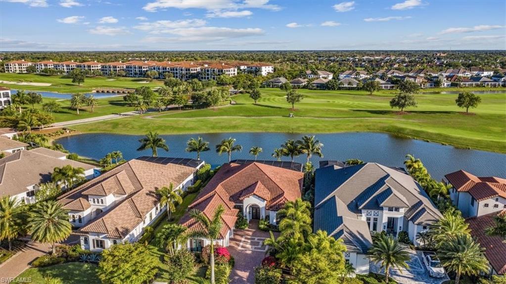 16434 Seneca Way Naples, FL 34110 - Photo 27 of 34 an aerial view of a house with a lake view