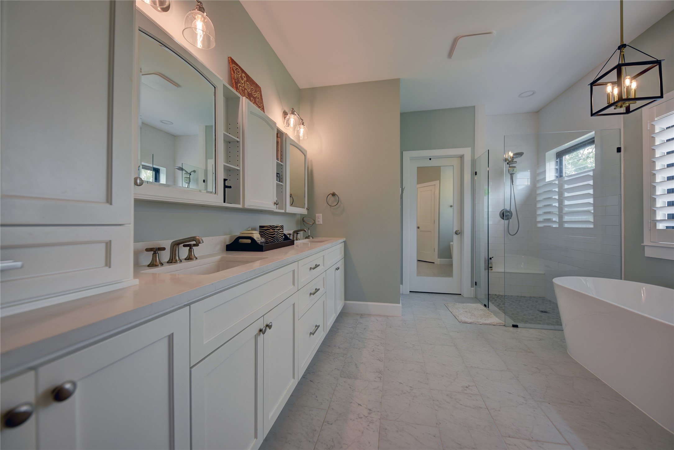 2055 Randle Hill Road Brenham, TX 77833 - Photo 21 of 23 a spacious bathroom with a double vanity sink a mirror and a shower