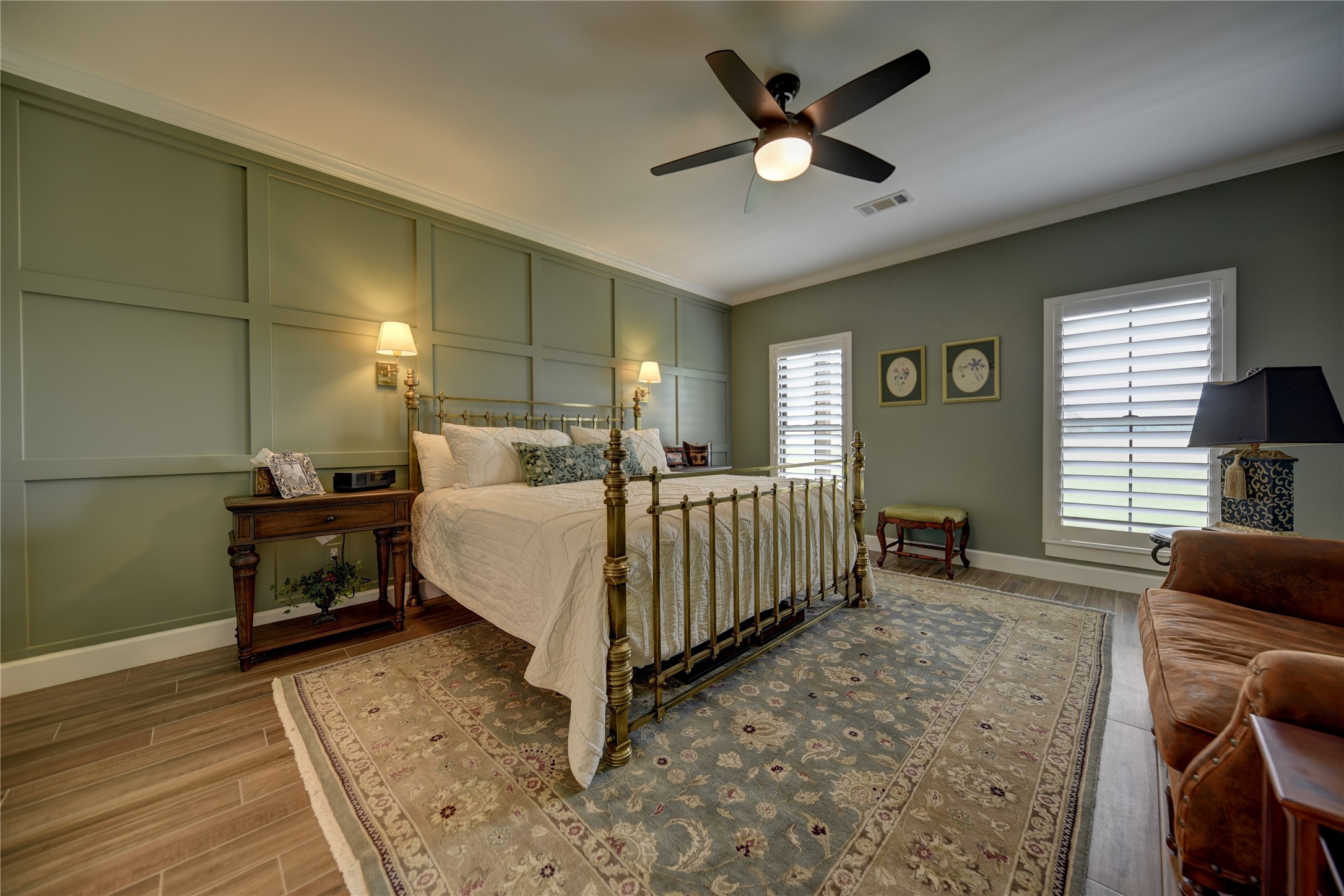 2055 Randle Hill Road Brenham, TX 77833 - Photo 22 of 23 a bedroom with a bed and a chandelier