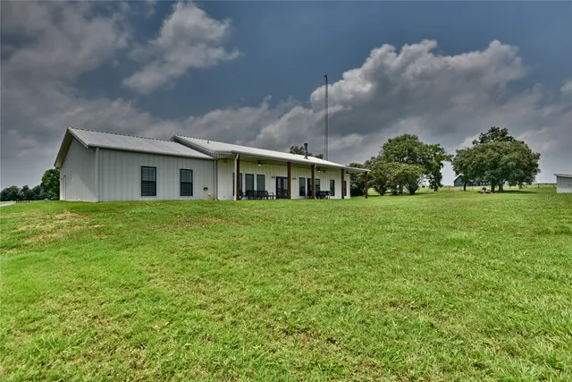 a house view with garden space