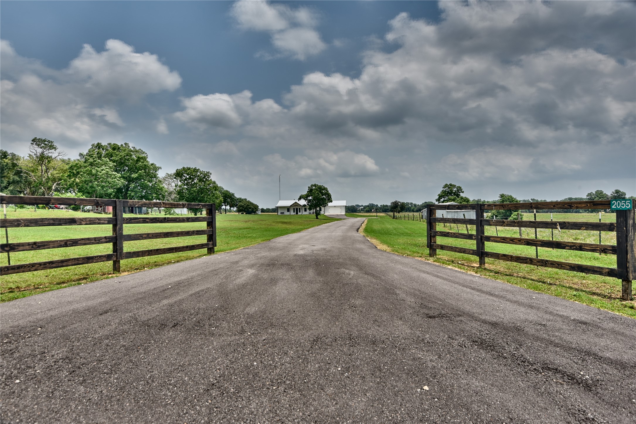 2055 Randle Hill Road Brenham, TX 77833 - Photo 6 of 23 a view of road with grass and a yard