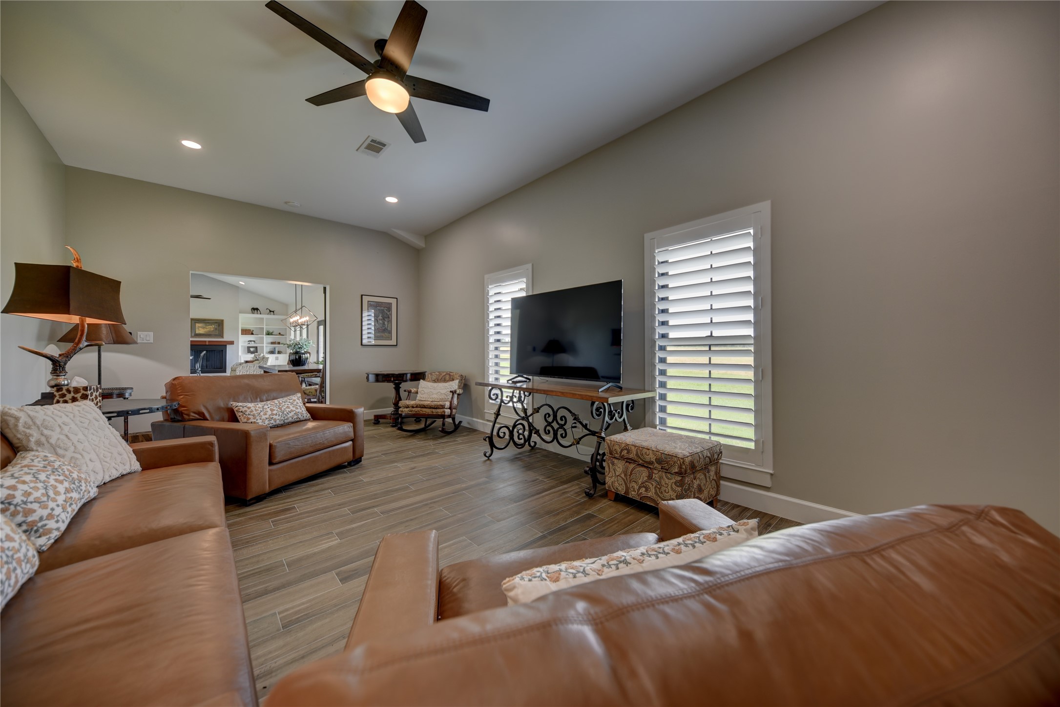 2055 Randle Hill Road Brenham, TX 77833 - Photo 9 of 23 a living room with furniture and a flat screen tv