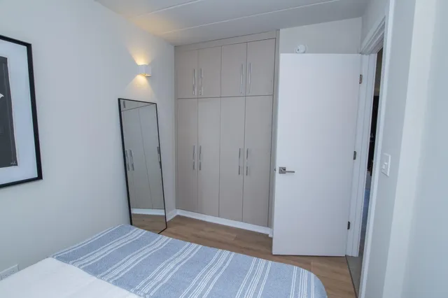 a view of wooden floor in an empty room