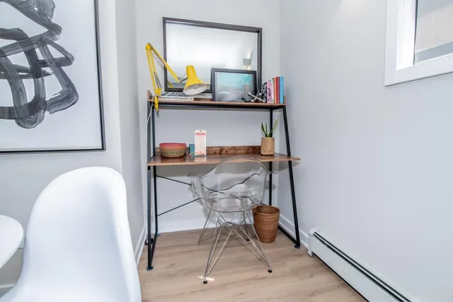 a room with a table and chairs