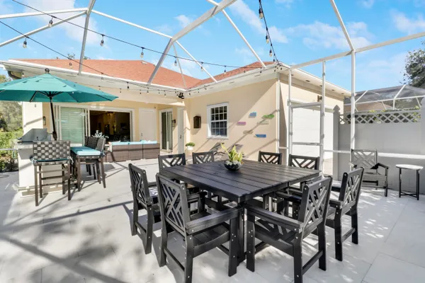 a view of a table and chairs in patio