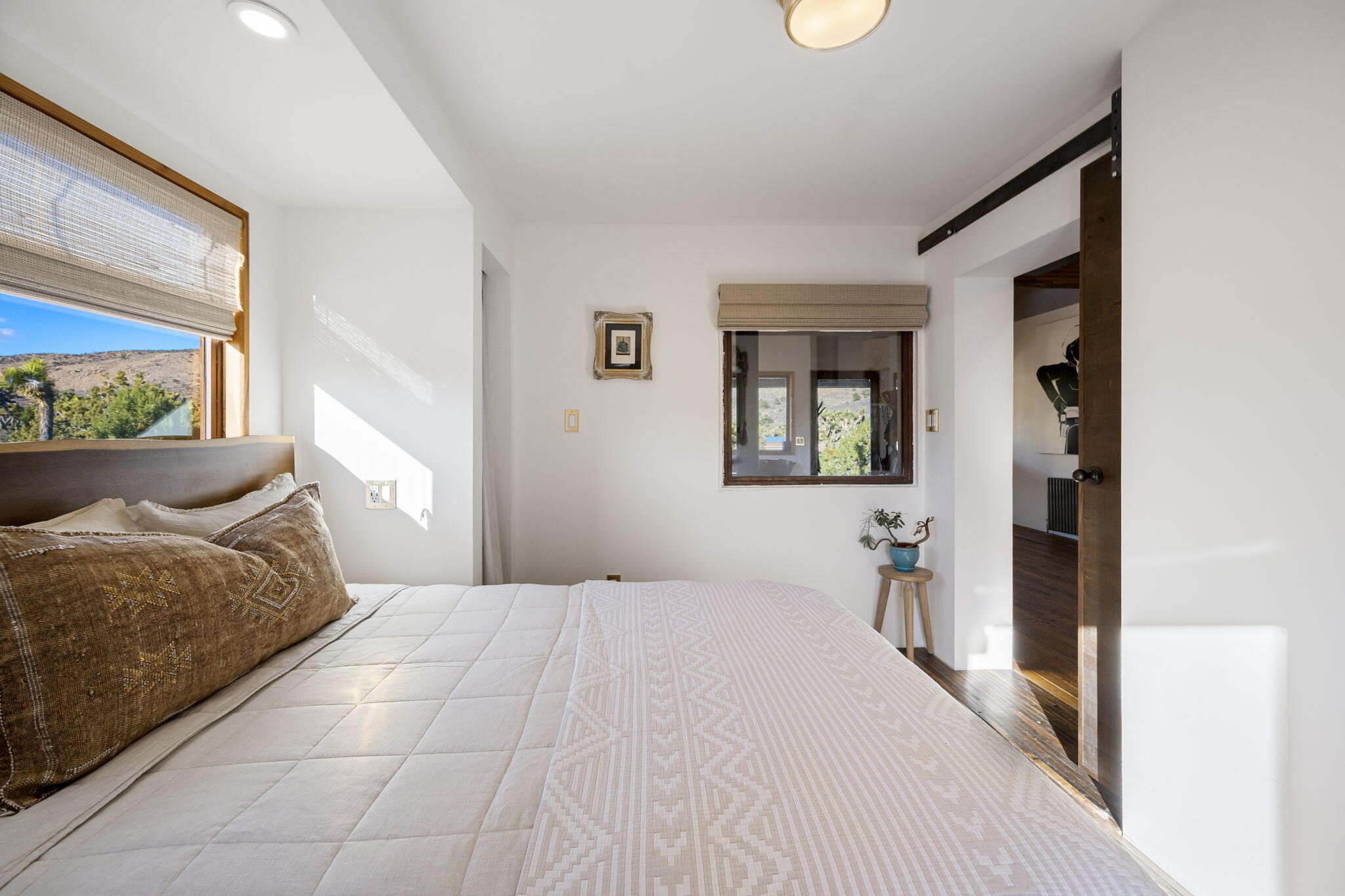 1102 Burlington Road Landers, CA 92285 - Photo 33 of 68 a bedroom with a large bed and a window