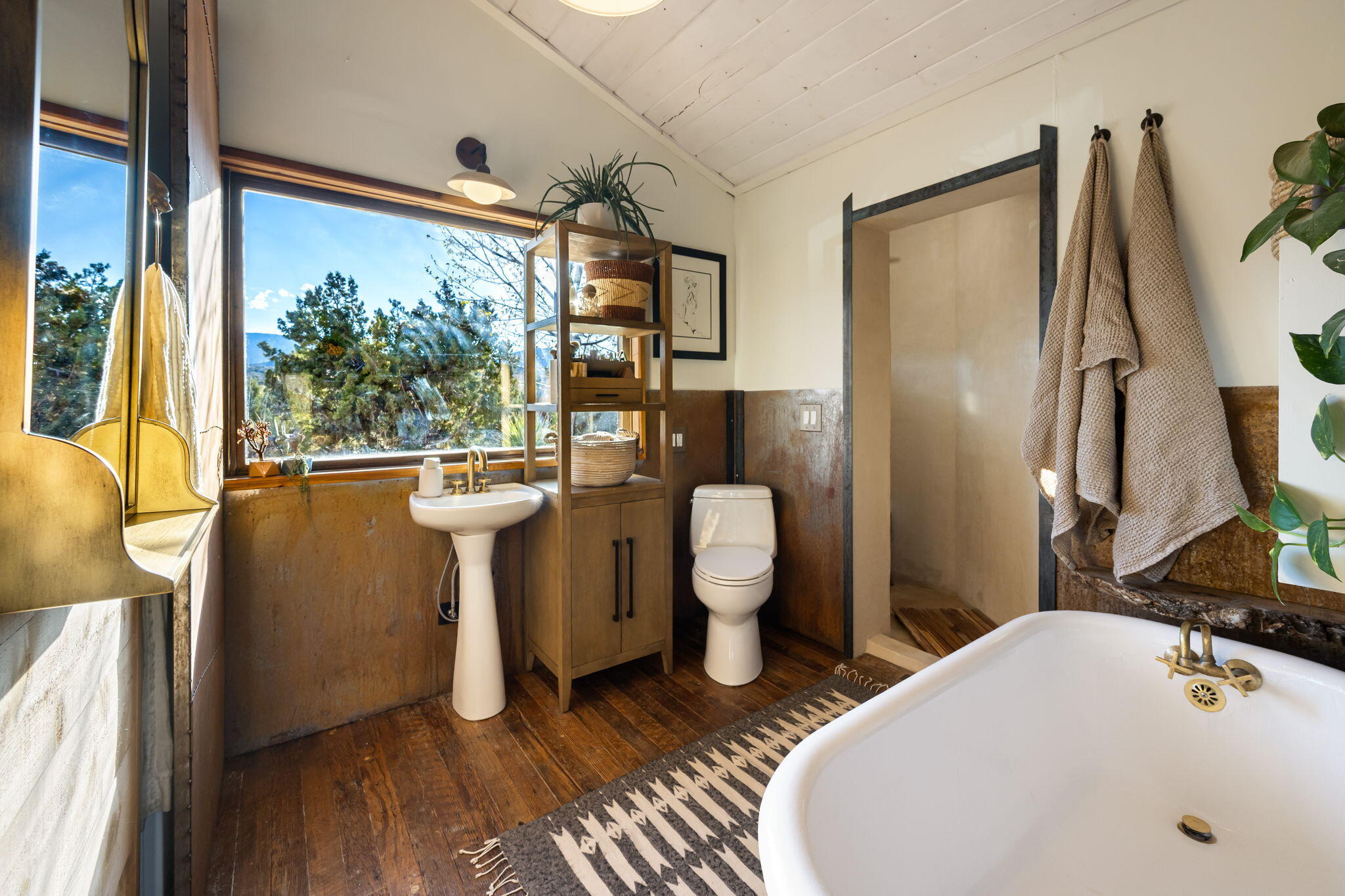 1102 Burlington Road Landers, CA 92285 - Photo 35 of 68 a bathroom with a sink toilet and shower
