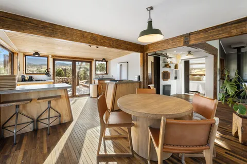 a view of a balcony with wooden floor