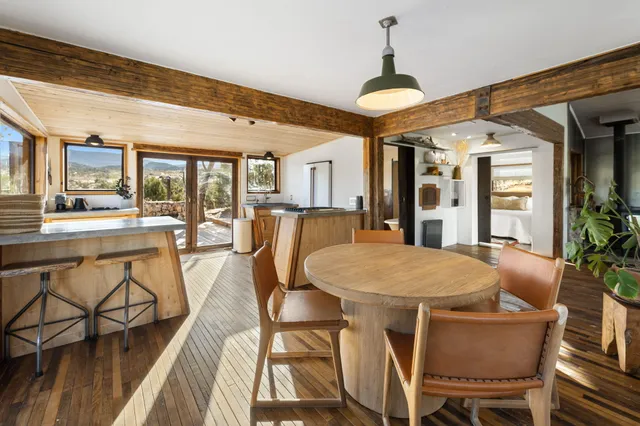 a view of a balcony with wooden floor