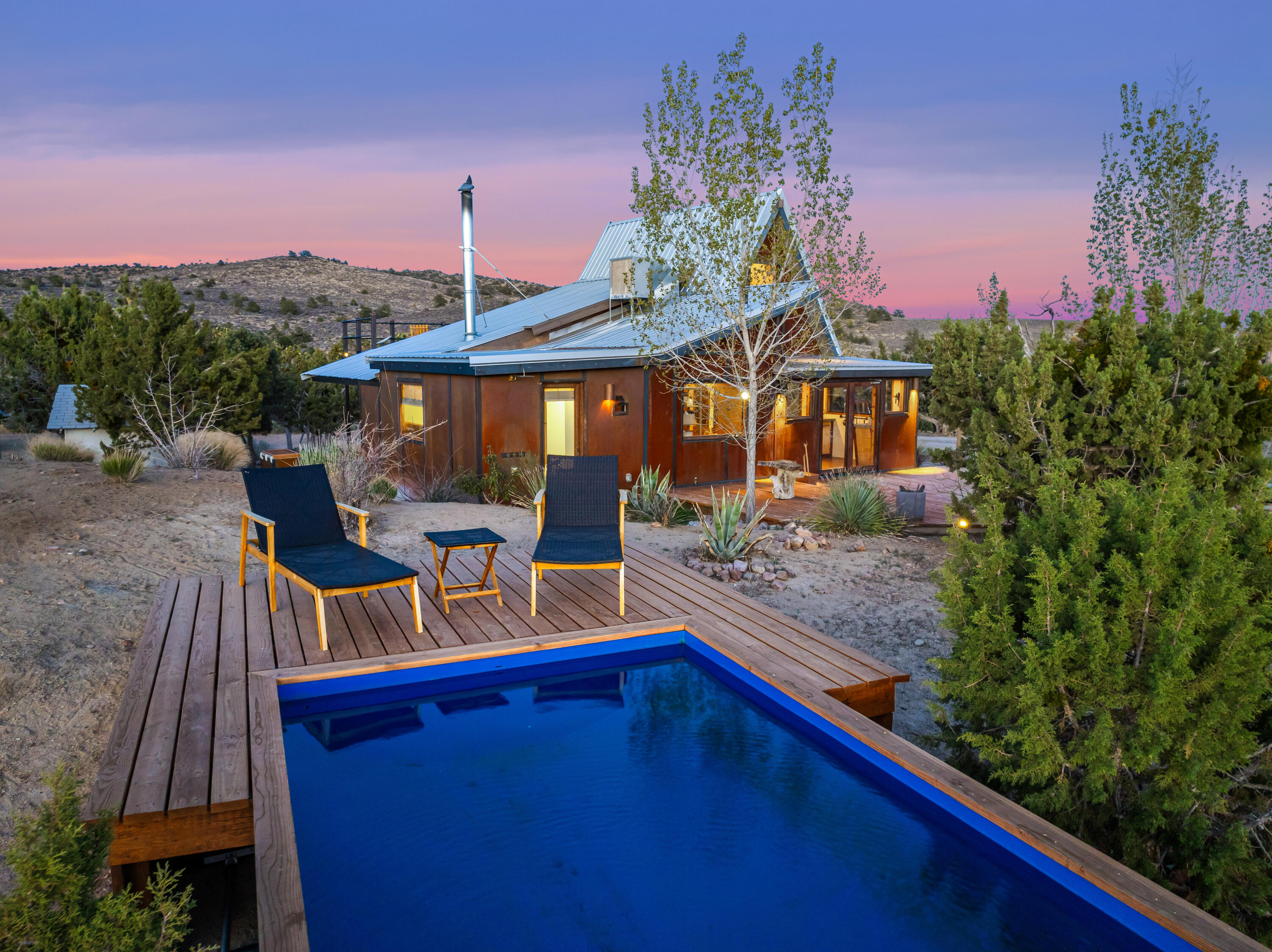 1102 Burlington Road Landers, CA 92285 - Photo 4 of 68 a view of a house with a patio