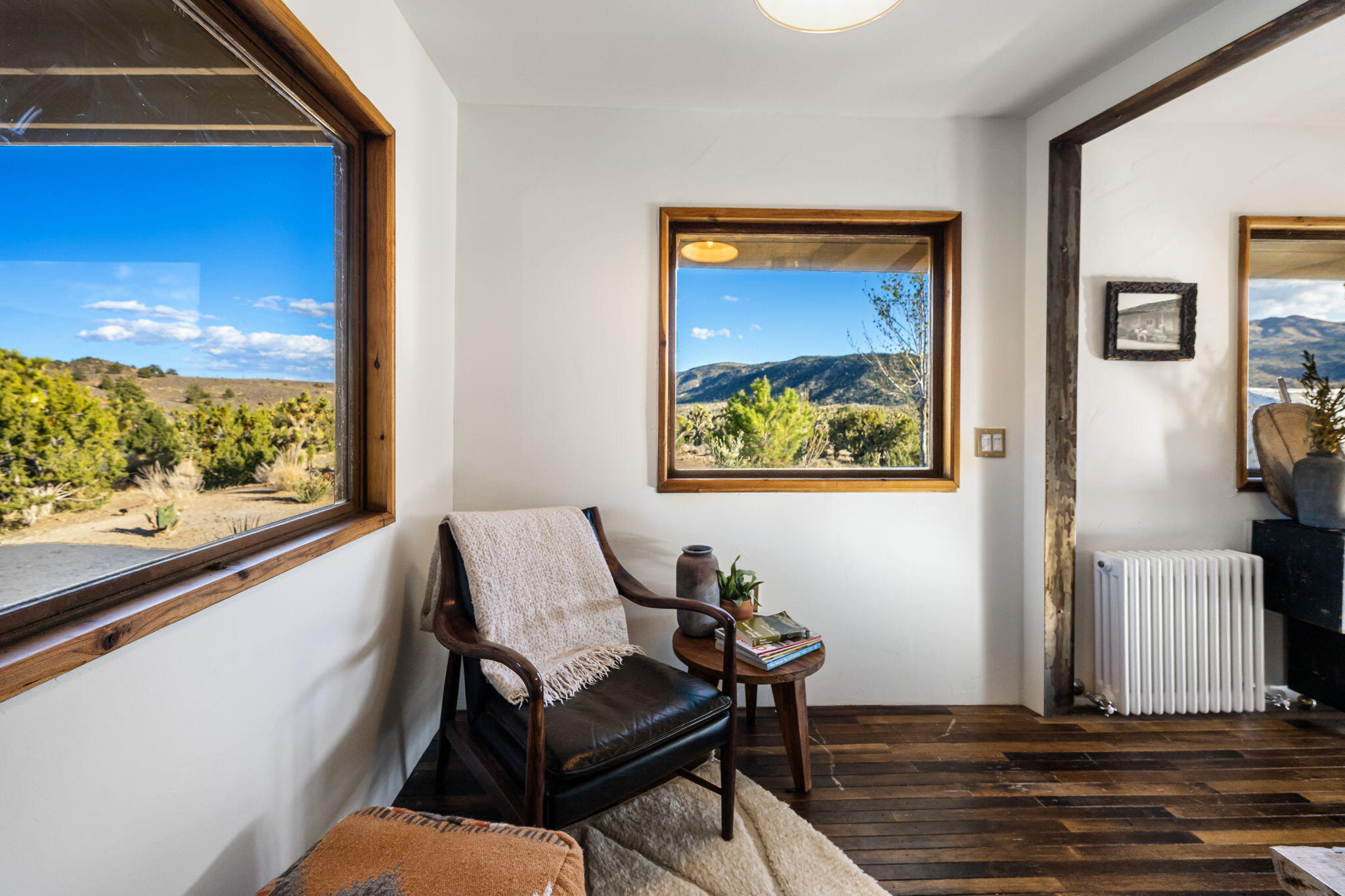1102 Burlington Road Landers, CA 92285 - Photo 42 of 68 a view of a livingroom with furniture wooden floor and a window