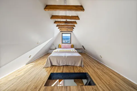 a view of a car park in front of a building