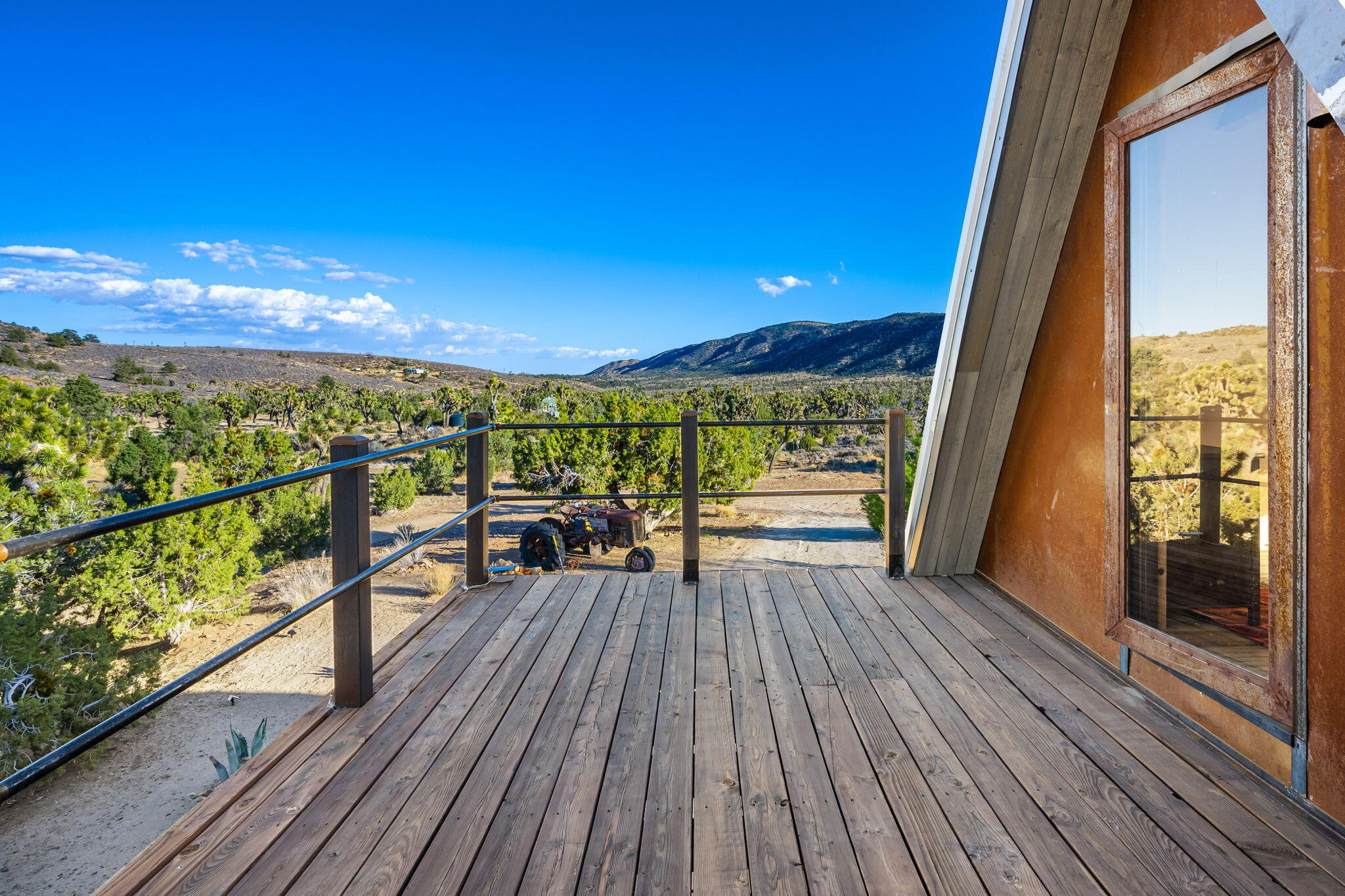 1102 Burlington Road Landers, CA 92285 - Photo 48 of 68 a view of a balcony with wooden floor
