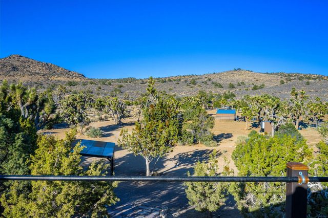 a view of a town with mountains in the background