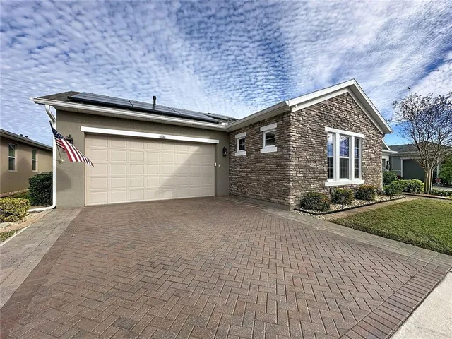 a room with furniture and wooden floor