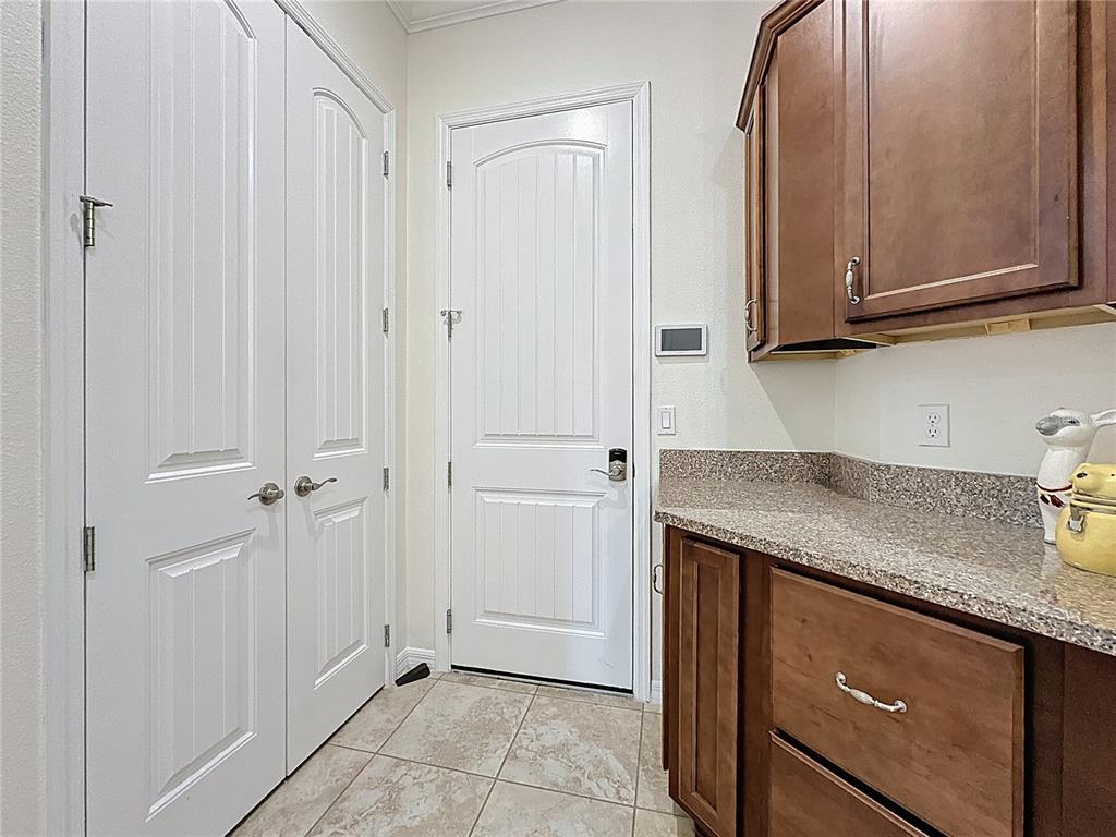 168 Silver Maple Road Groveland, FL 34736 - Photo 21 of 71 a view of a kitchen with granite countertop cabinets