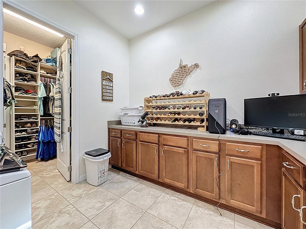 168 Silver Maple Road Groveland, FL 34736 - Photo 31 of 71 a kitchen with a stove and a sink