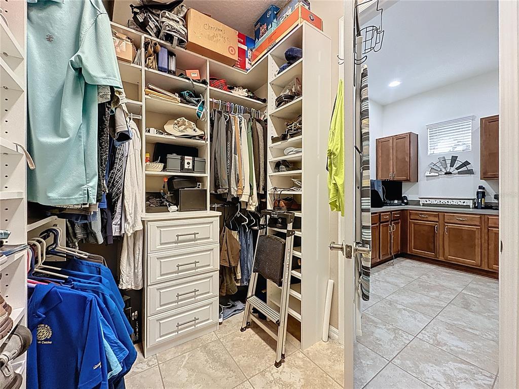 168 Silver Maple Road Groveland, FL 34736 - Photo 33 of 71 a view of walk in closet
