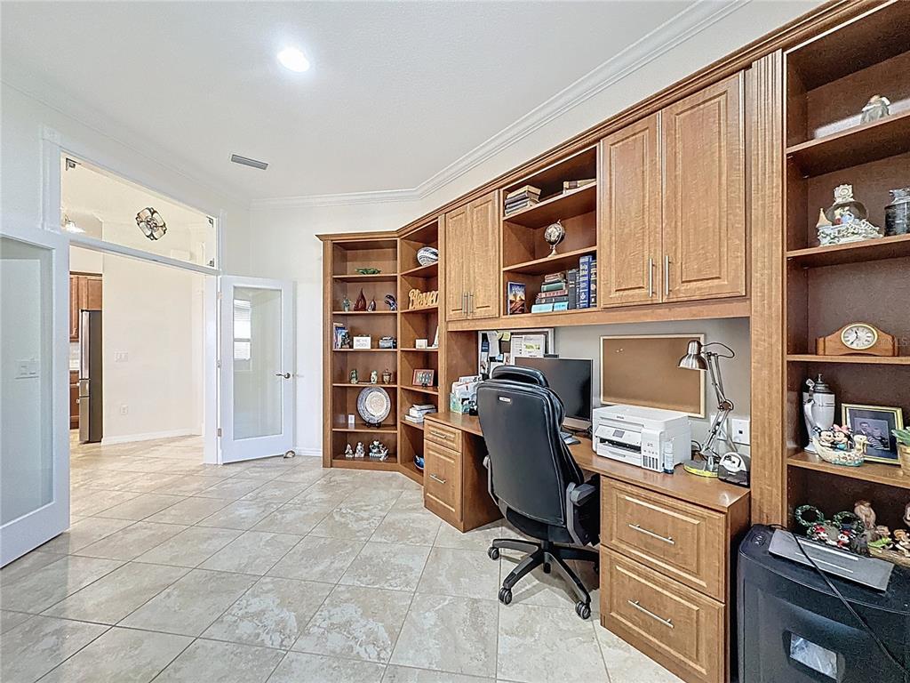 168 Silver Maple Road Groveland, FL 34736 - Photo 42 of 71 a view of a workspace with furniture