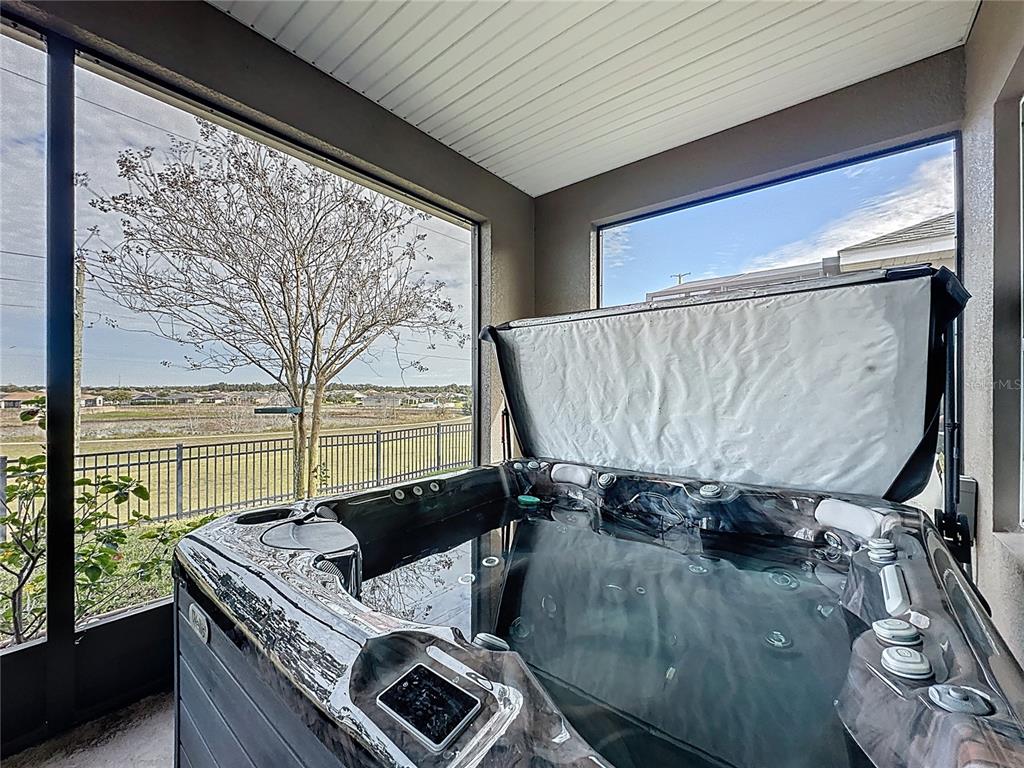 168 Silver Maple Road Groveland, FL 34736 - Photo 51 of 71 a view of living room with furniture and a window
