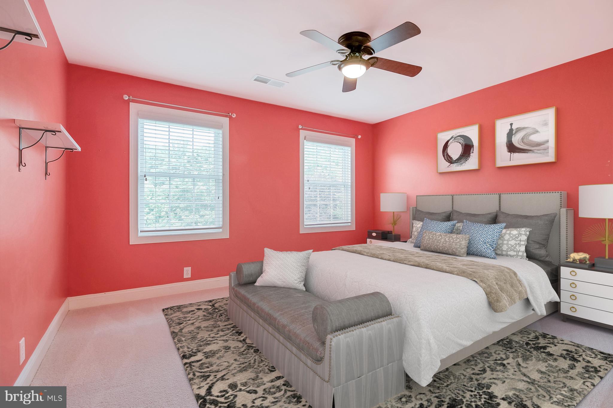 206 Fern Ridge Landenberg, PA 19350 - Photo 21 of 34 a bedroom with a large bed and a chandelier
