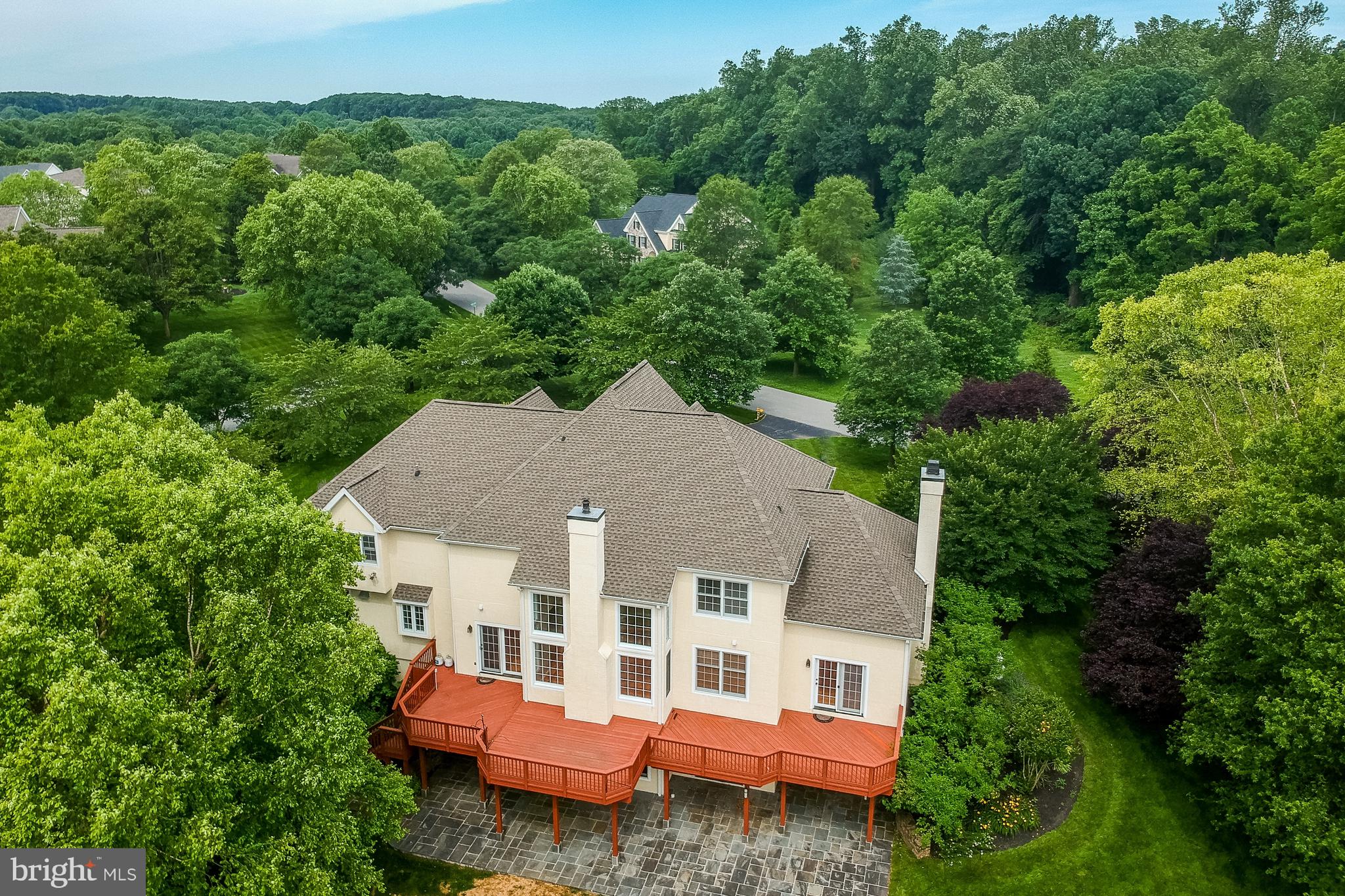 206 Fern Ridge Landenberg, PA 19350 - Photo 32 of 34 an aerial view of a house with yard table and chairs