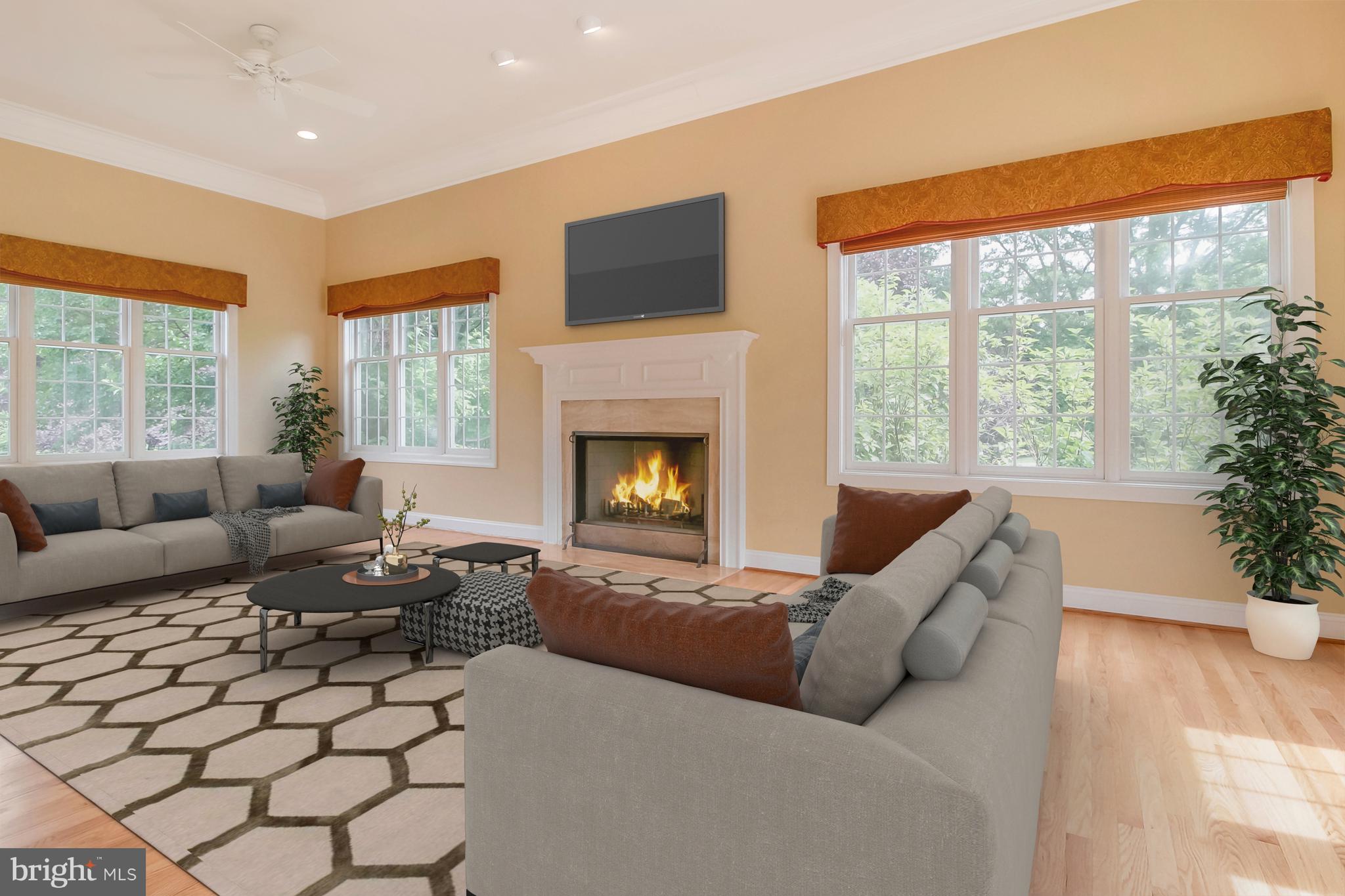206 Fern Ridge Landenberg, PA 19350 - Photo 8 of 34 a living room with furniture large window and a fireplace