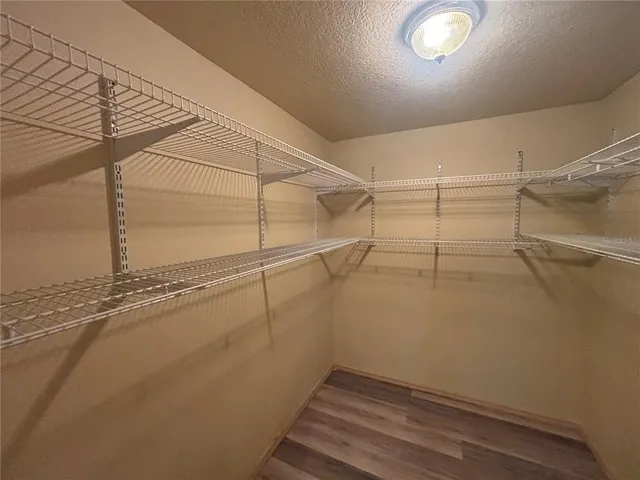 a view of a room with racks on the wall