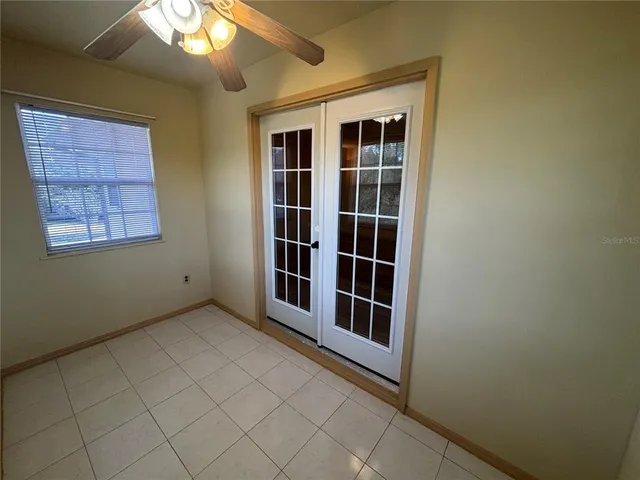 an empty room with windows