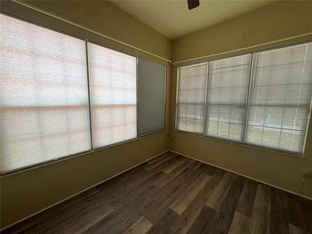 a bathroom with a sink a toilet and vanity