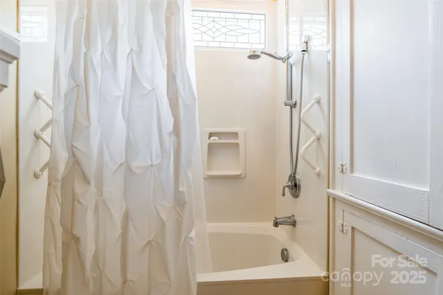 a bathroom with a bathtub