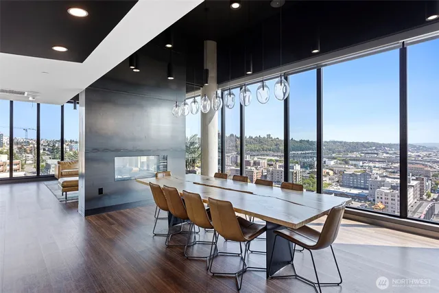 a living room with fireplace furniture and a flat screen tv