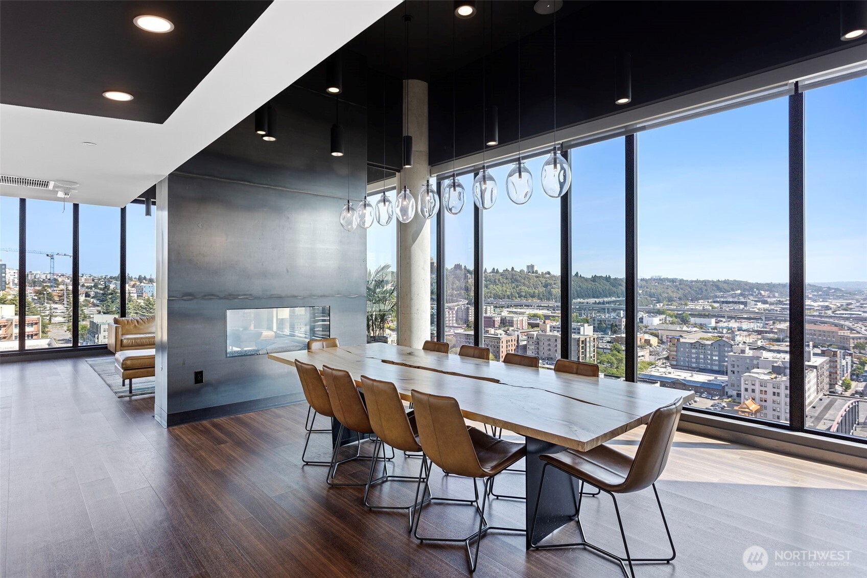 450 South Main Street, Unit 1005 Seattle, WA 98104 - Photo 18 of 33 a dining room with furniture window and wooden floor