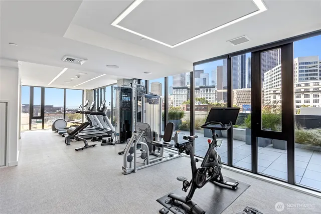 a lobby with furniture and wooden floor