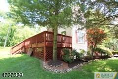 6 Pleasant View Road Lebanon, NJ 08833 - Photo 3 of 24 a view of a backyard with potted plants and large trees