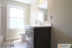6 Pleasant View Road Lebanon, NJ 08833 - Photo 22 of 24 a bathroom with a sink vanity and a mirror