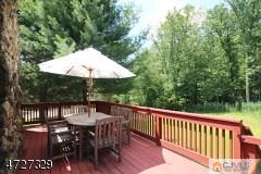 6 Pleasant View Road Lebanon, NJ 08833 - Photo 6 of 24 a view of a table and chairs on the roof deck