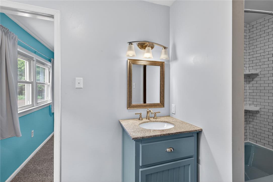 1371 Stoke Park Road Bethlehem, PA 18017 - Photo 43 of 55 a bathroom with a sink and a mirror