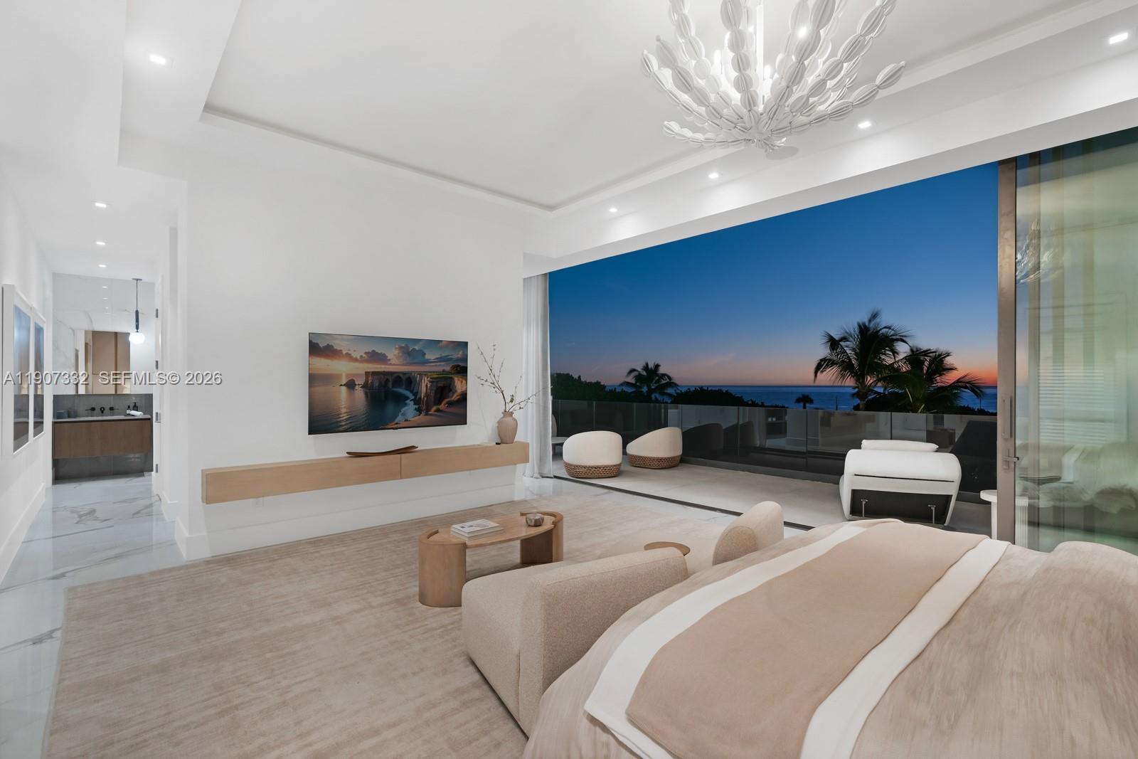 7845 Atlantic Way Miami Beach, FL 33141 - Photo 26 of 89 a living room with furniture and a flat screen tv