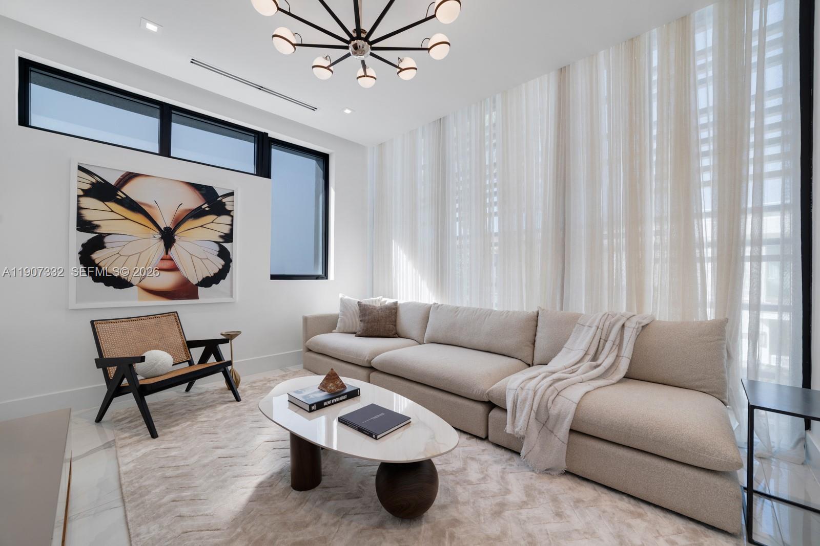 7845 Atlantic Way Miami Beach, FL 33141 - Photo 54 of 89 a living room with furniture and wooden floor