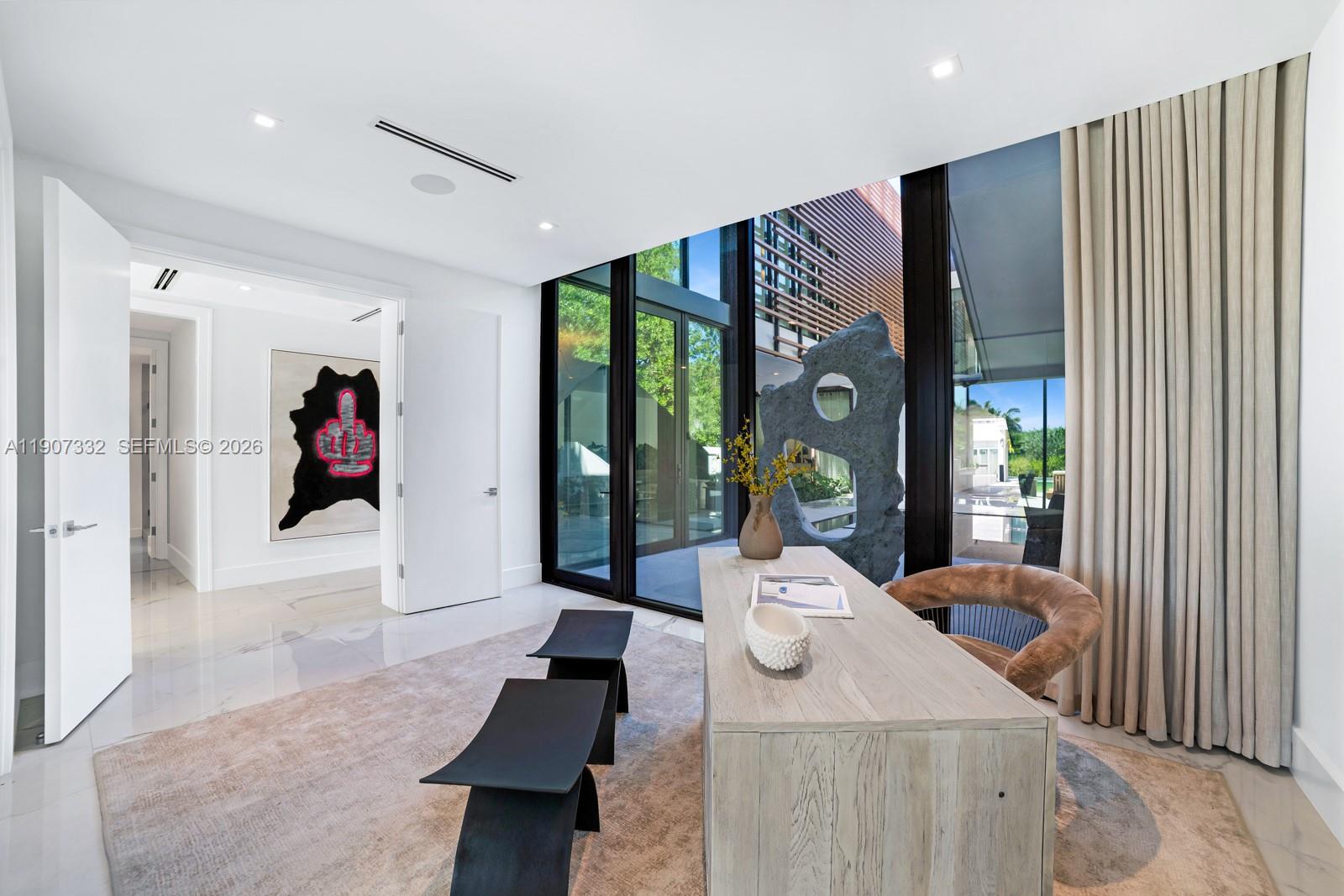 7845 Atlantic Way Miami Beach, FL 33141 - Photo 65 of 89 a living room with furniture and large window