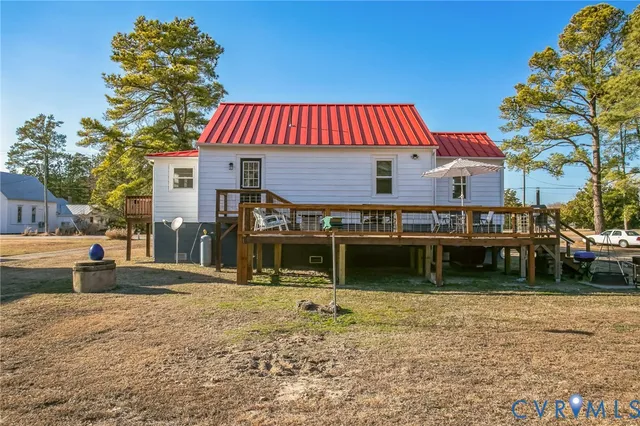 a view of balcony with wooden floor and lake view