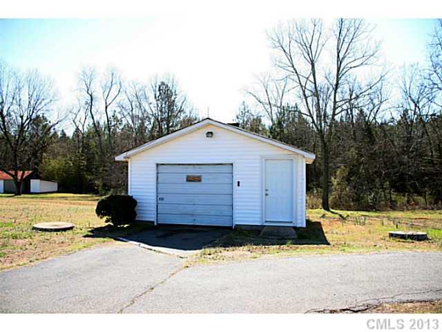 6441 Stirewalt Road Kannapolis, NC 28081 - Photo 2 of 16 a view of a backyard of the house